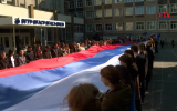 Воронежские студенты развернули 30-метровый флаг страны в честь годовщины воссоединения новых регионов с Россией