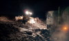 Больше 160 тонн мусора из трех районов области застряли у полигона в Анне